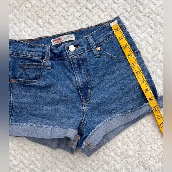 Levi’s High Rise Festival Light Blue Wash Denim Cutoff Frayed Cuffed Hem Shorts - Picture 9 of 11